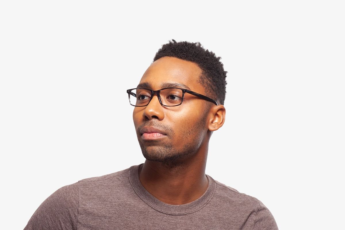 Manny Grey Stripe eyeglasses by Chemistrie worn by male model, side view