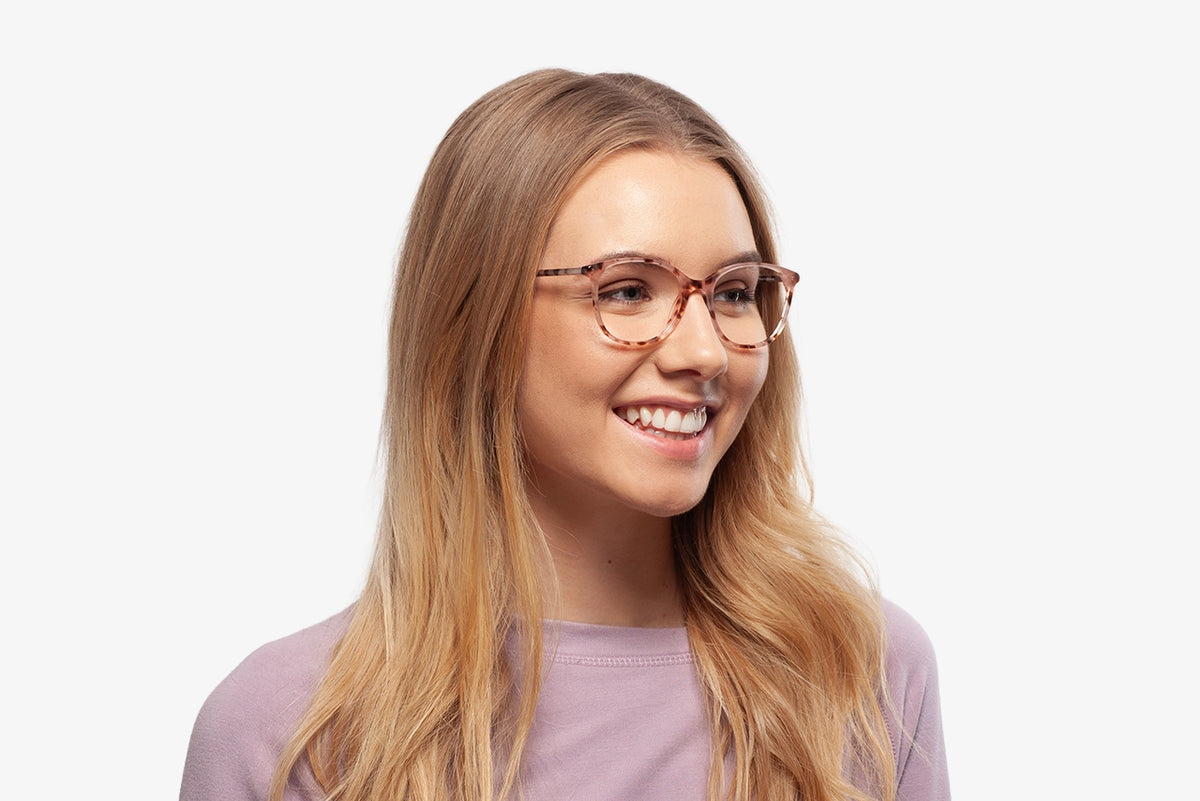 Pink Margot eyeglasses by Chemistrie worn by female model, side view