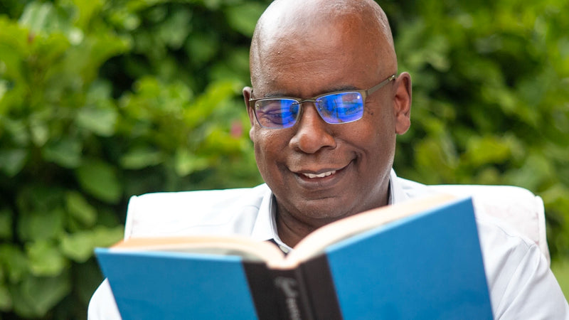 Person reading with Reader Clips