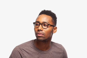 Green Stipe Alex eyeglasses by Chemistrie worn by male model, side view