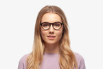 Black Allen eyeglasses by Chemistrie worn by female model, fornt view
