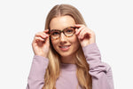 Blue Tortoies Allison eyeglasses by Chemistrie worn by female model, front view