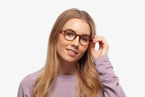 Tortoise Alpha eyeglasses by Chemistrie worn by female model, front view