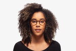 Tortoise Alpha eyeglasses by Chemistrie worn by female model, front view
