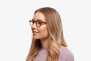 Tortoise Alpha eyeglasses by Chemistrie worn by female model, side view