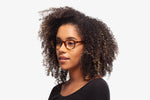 Tortoise Alpha eyeglasses by Chemistrie worn by female model, side view