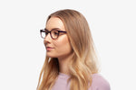 Crystal Burgundy Alyssa eyeglasses by Chemistrie worn by female model, side view
