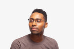 Gunmetal Blue Andrew eyeglasses by Chemistrie worn by male model, side view