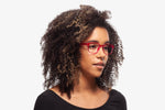 Burgundy Bravo eyeglasses by Chemistrie worn by female model, side view