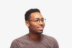 Grey Bravo eyeglasses by Chemistrie worn by male model, side view