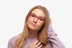 Pink Bravo eyeglasses by Chemistrie worn by female model, front view