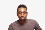 Black Briar eyeglasses by Chemistrie worn by male model, front view