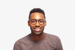 Black Cameron eyeglasses by Chemistrie worn by male model, front view