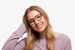 Blue Cameron eyeglasses by Chemistrie worn by female model, front view