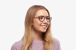 Blue Cameron eyeglasses by Chemistrie worn by female model, side view