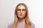 Tortoise Casey eyeglasses by Chemistrie worn by female model, front view