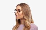 Tortoise Casey eyeglasses by Chemistrie worn by female model, side view
