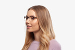 Blue Chloe eyeglasses by Chemistrie worn by female model, side view