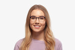 Blue Chloe eyeglasses by Chemistrie worn by female model, front view