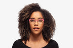 Pink Chloe eyeglasses by Chemistrie worn by female model, front view