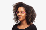 Pink Chloe eyeglasses by Chemistrie worn by female model, side view
