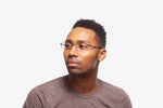 Silver Codie eyeglasses by Chemistrie worn by male model, side view
