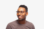Brown Doug eyeglasses by Chemistrie worn by male model, side view
