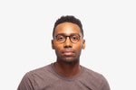 Black Frankie eyeglasses by Chemistrie worn by male model, front view