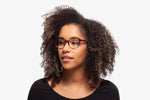 Violet Grace eyeglasses by Chemistrie worn by female model, side view