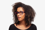 Blue and Red Jack eyeglasses by Chemistrie worn by female model, front view