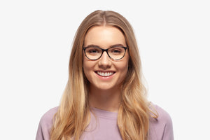 Blue Julia eyeglasses by Chemistrie worn by female model, front view