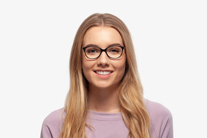 Black Laura eyeglasses by Chemistrie worn by female model, front view