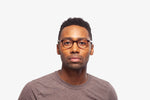 Tortoise Logan eyeglasses by Chemistrie worn by male model, front view