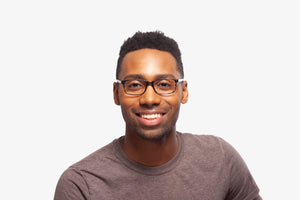 Manny Grey Stripe eyeglasses by Chemistrie worn by male model, front view