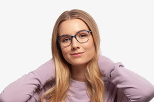 Blue Margot eyeglasses by Chemistrie worn by female model, front view