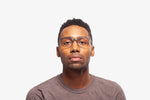 Gunmetal Mark eyeglasses by Chemistrie worn by male model, front view