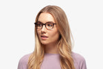 Tortoise Milan eyeglasses by Chemistrie worn by female model, side view