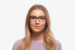 Cranberry Modena eyeglasses by Chemistrie worn by female model, front view