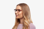 Cranberry Modena eyeglasses by Chemistrie worn by female model, side view