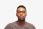 Black Pesaro eyeglasses by Chemistrie worn by male model, front view