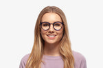 Blue Stacey eyeglasses by Chemistrie worn by female model, font view
