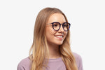 Blue Stacey eyeglasses by Chemistrie worn by female model, side view