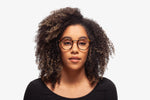 Tortoise Stacey eyeglasses by Chemistrie worn by female model, front view