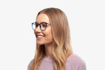 Blue Taylor eyeglasses by Chemistrie worn by female model, side view