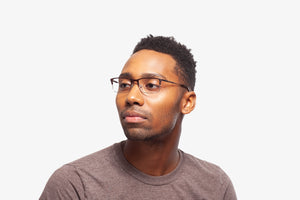 Amber Tortoise Thomas eyeglasses by Chemistrie worn by male model, side view