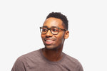 Olive Trento eyeglasses by Chemistrie worn by male model, side view