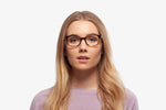 Tortoise Venice eyeglasses by Chemistrie worn by female model, front view